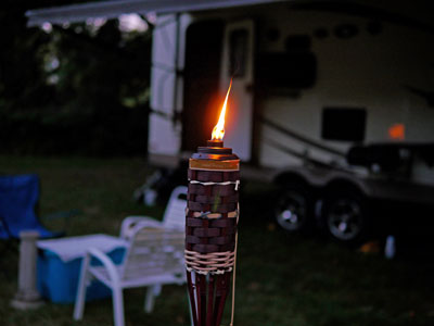 tiki torce in front of trailer